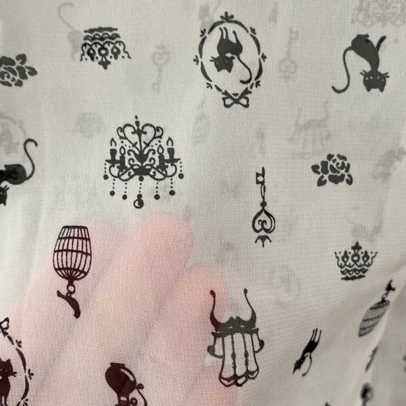 Sheer Keyhole Whimsical Top - Picture 5 of 5